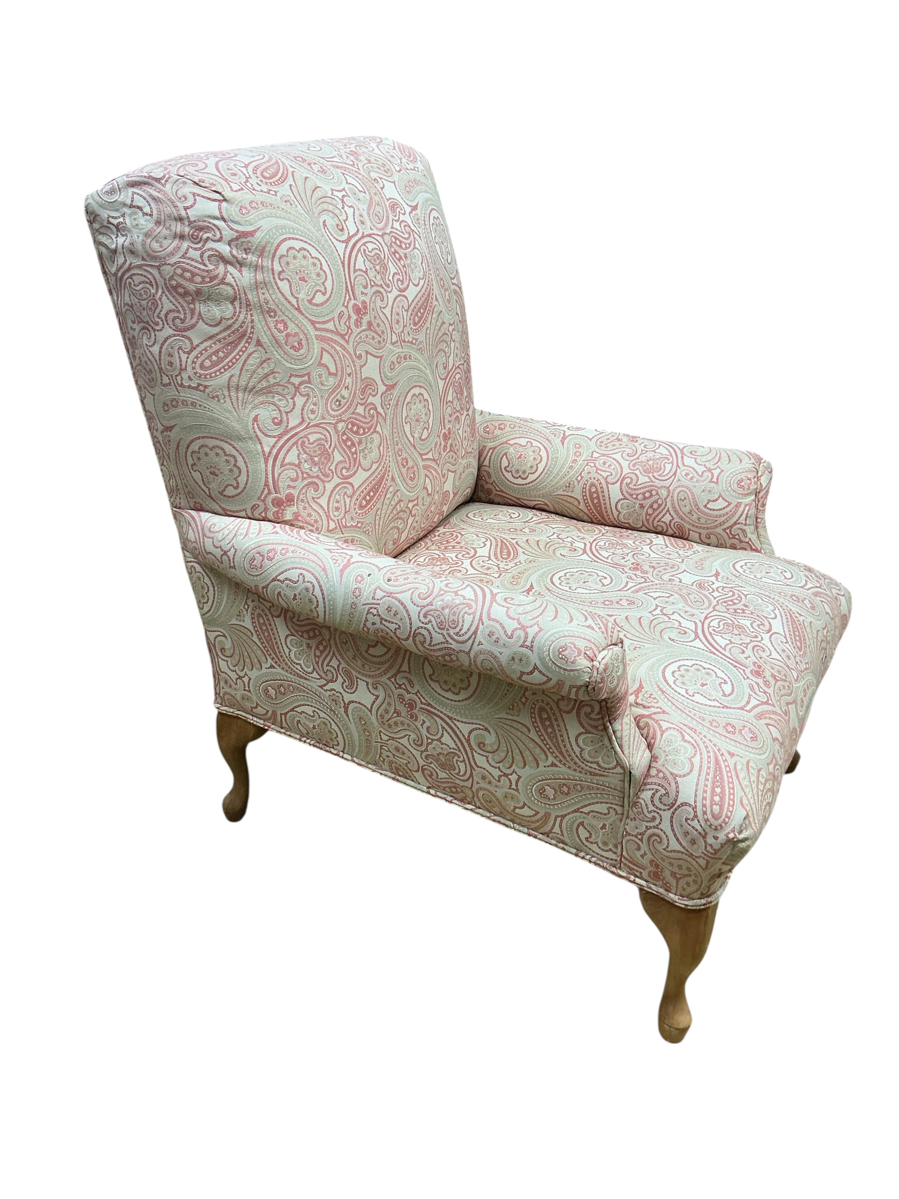 A Victorian style upholstered armchair, width 80cm, depth 78cm, height 98cm